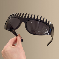 Black Sunglasses With Serrated Edges